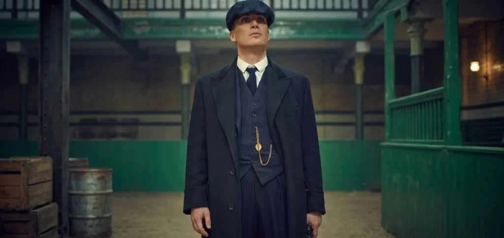 Tommy Shelby three-piece tweed suit flat cap 1920s Peaky Blinders style