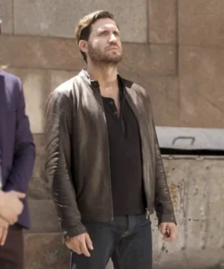 The Last Days of American Crime Edgar Ramírez Brown Jacket