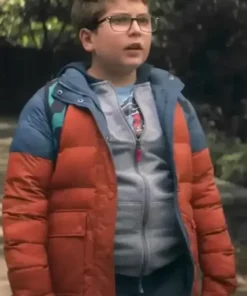 Dear-Santa-Robert-Timothy-Smith-Orange-Puffer-Jacket