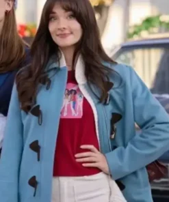 Eva-Bourne-A-’90s-Christmas-2024-Blue-Jacket