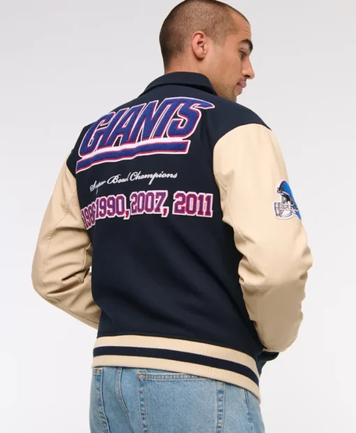 Buy Now New York Giants Navy Blue And OFF-White Varsity Jacket For Unisex