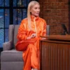 Gwyneth Paltrow Embraced A Playful Energy Orange Satin Tracksuit