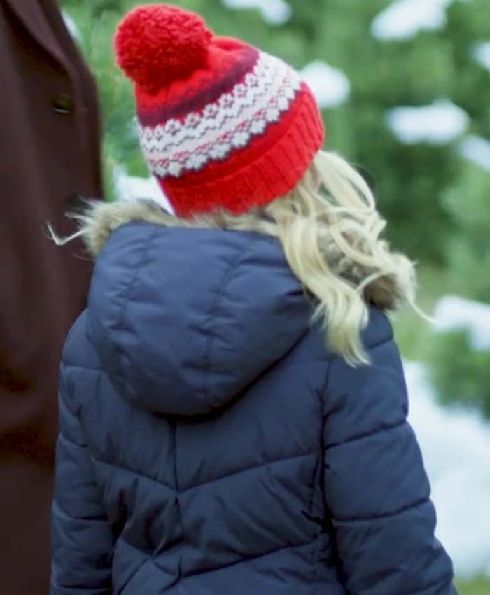 A Christmas Prayer Madeleine Cox Blue Puffer Jacket - Image 3