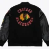 Buy Now Chicago Blackhawks Black Out Team Logo Varsity Jacket For Unisex