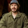 Elton Perrakis The Running Man Michael Cera Green Jacket