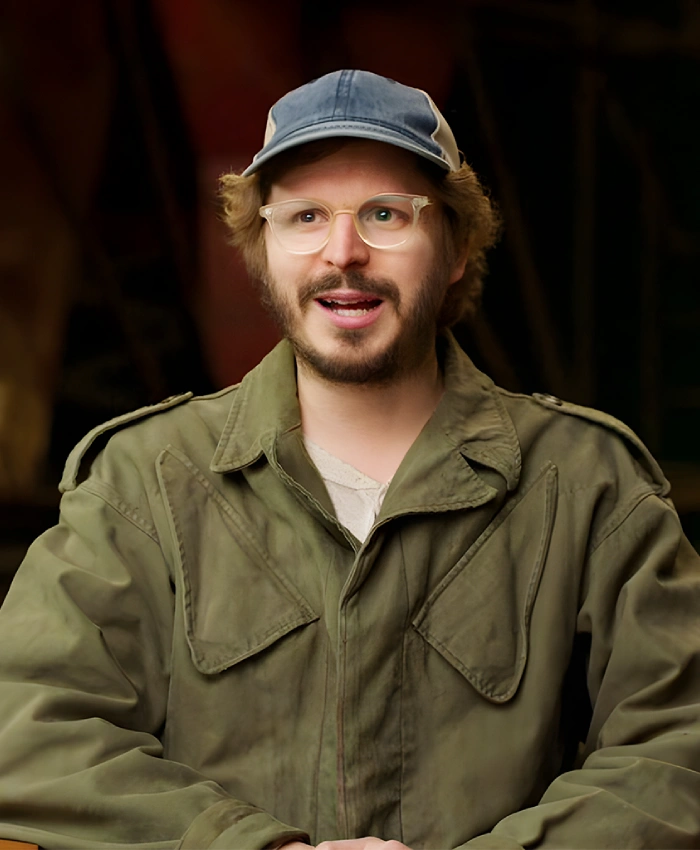 Elton Perrakis The Running Man Michael Cera Green Jacket