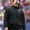 New Orleans Saints 2025 Coach Kellen Moore Black Hooded Full Zip Rain Jacket