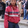 Paris Fashion Week 2026 Little Simz Red Jacket With Navy And Grey Stripes On Front