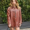 Tods FW26 Fashion Show Milan 2026 Lily James Brown Leather Jacket