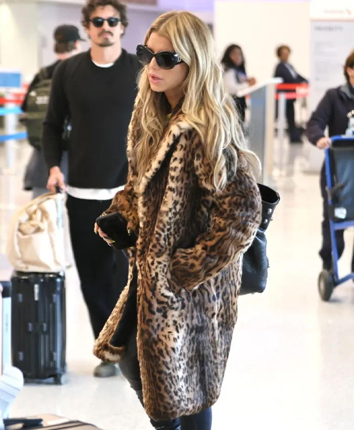 Lax Airport In Los Angeles Jessica Simpson Leopard Print Fur Coat